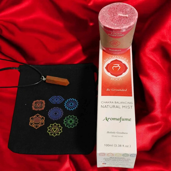 Kit Karma Pop Svadhisthana avec spray chakra, bougie orange parfumée, pendentif prisme orangé et pochette imprimée des 7 chakras. Kit énergétique chakra, affirmations et rituel mantra du matin.